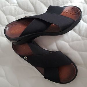Bzees (Desire) black slip on platform sandals with stretch cross straps.